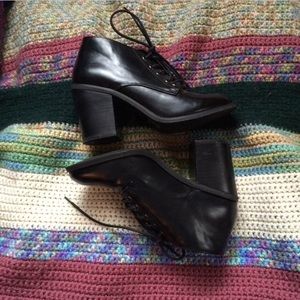 Black faux leather booties