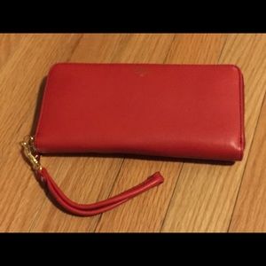 Fossil zip clutch