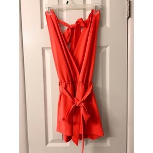 NWT Backless halter orange jumpsuit with pockets