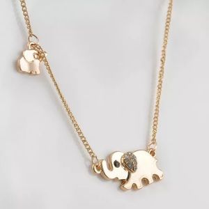 Elephant necklace gold color