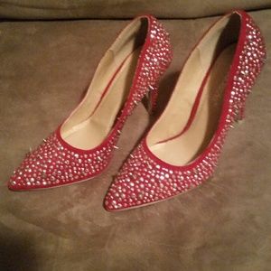 Red and silver pumps