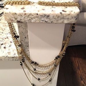 Multiple chain gold necklace