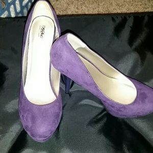 Purple suede pumps