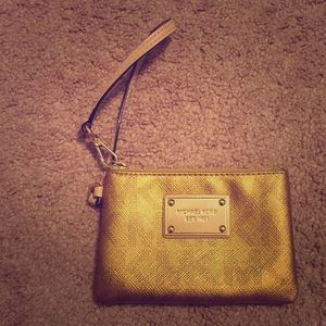 | Sold | Gold Michael Kors Wristlet