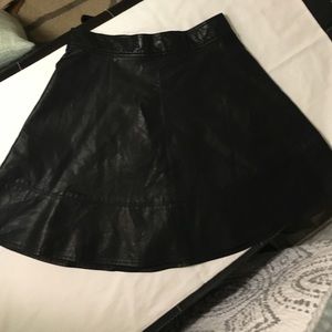 Small Black leather (not real) flared skirt