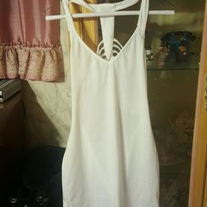 white dress with designs in the back of ot