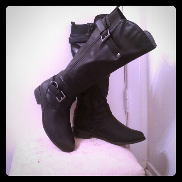 Tall black boots.