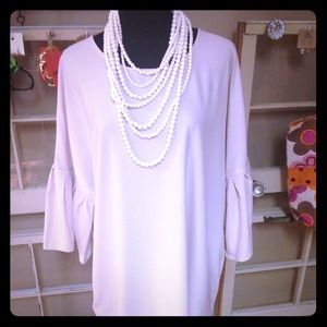UMGEE cream colored blouse
