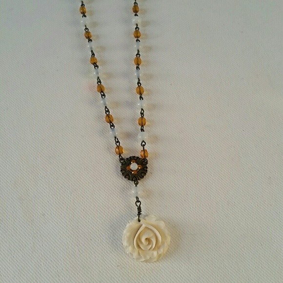 Beautiful amber and carved necklace