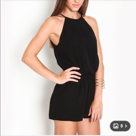 Black sleeveless jumper/romper new in pkg. trendy - Picture 2 of 3