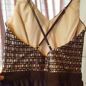 Black and beige romper.