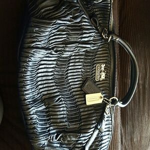 XL Coach purse. Navy blue. It is a gorgeous bag.