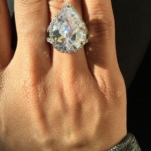 The Posh 9 Carat Pear Stone Halo Ring