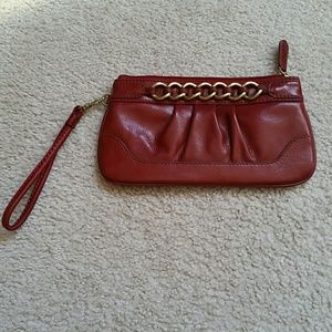 Red leather clutch