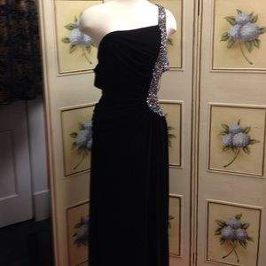New long Prom/formal dress with cut out to sides .