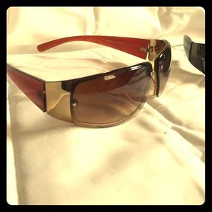 Brown and black with silver of gold trim sunglases