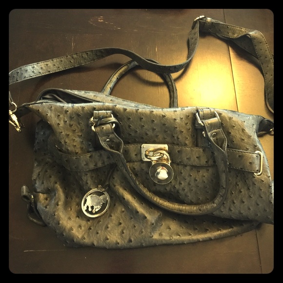 Gray hobo style bag with cross body strap