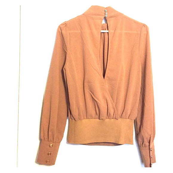 Never worn. Tag still on.