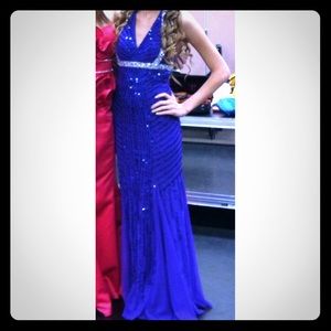 Purple beaded prom dress