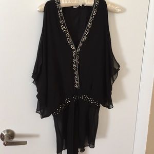 Miguelina sheer blouse.