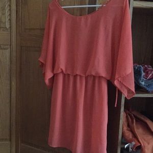 Orange summer dress. Open back