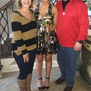 Beautiful black and gold sequined Bebe dress