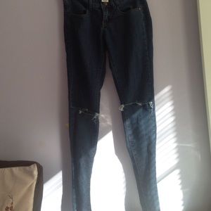 blue knee ripped jeans