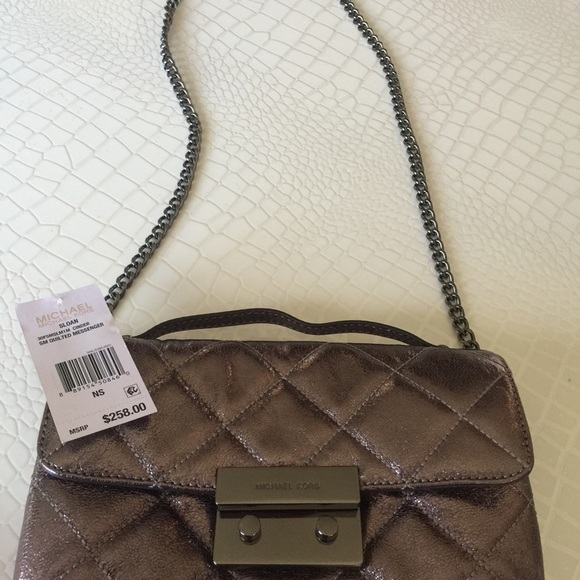 MICHAEL KORS
SLOAN QUILTED LEATHER SMALL CROSSBODY