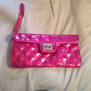 Small pink patten leather clutch.