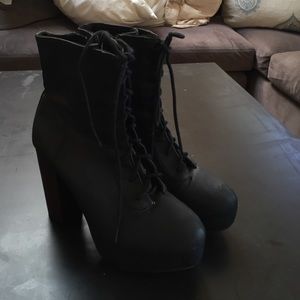 Black lace up heeled boots