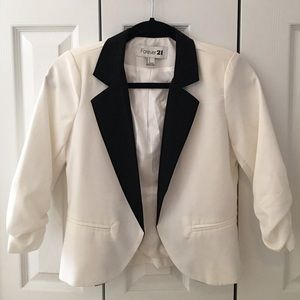 White blazer with black collar