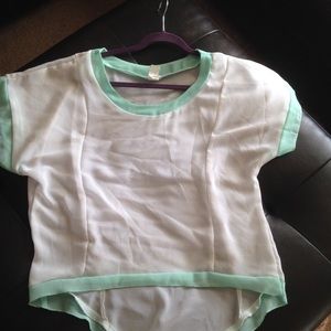 Sheer white shirt with teal trim