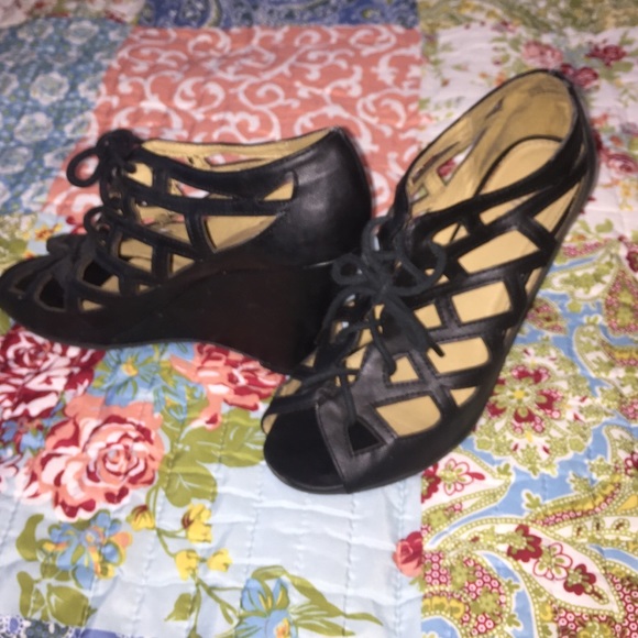 Laced up black wedges