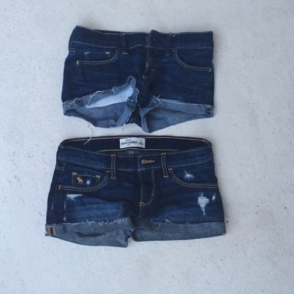 Two pairs of dark wash denim jean shorts