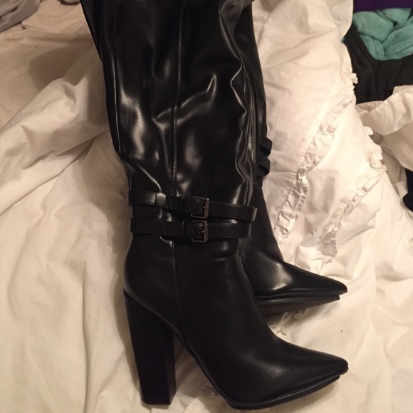 Black above the knee boots