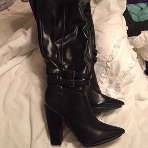 Black above the knee boots