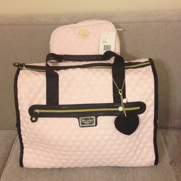 Betsey Johnson travel bag and cosmetic case!
