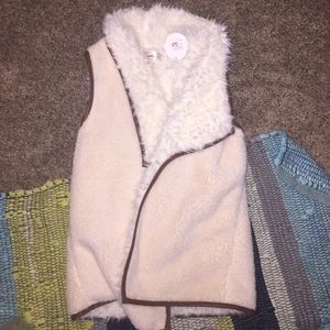 White faux fur vest