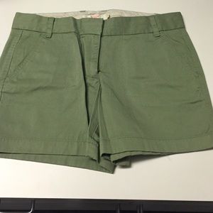 Green mid length shorts