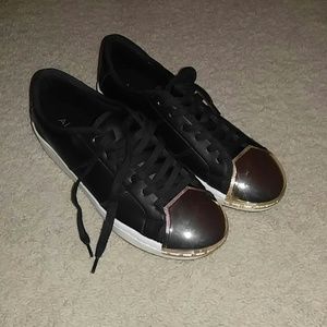 *BRAND NEW* Black and gold tennis shoes from ALDO