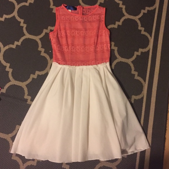 White and pink dress. Fluffy bottom.