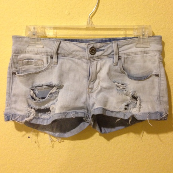 Light denim torn shorts