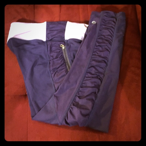 Purple Lululemon running crop tights