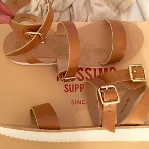 Brown buckled gladiator sandals