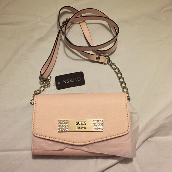 Guess Handbags - New with tags!!! Guess mini crossbody bag.