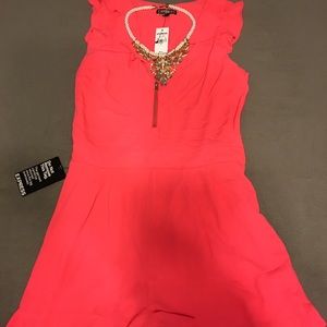 Coral New Express Romper!