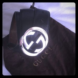 Gucci authentic black belt with silver GG buckle.