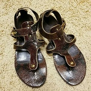 Imitation snake-skin sandles.