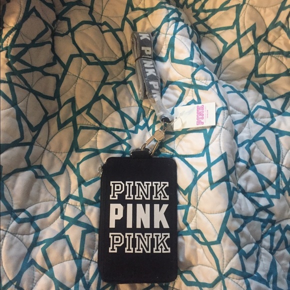 Pink vs lanyard and wallet,
