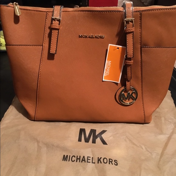 Tan and gold MK purse